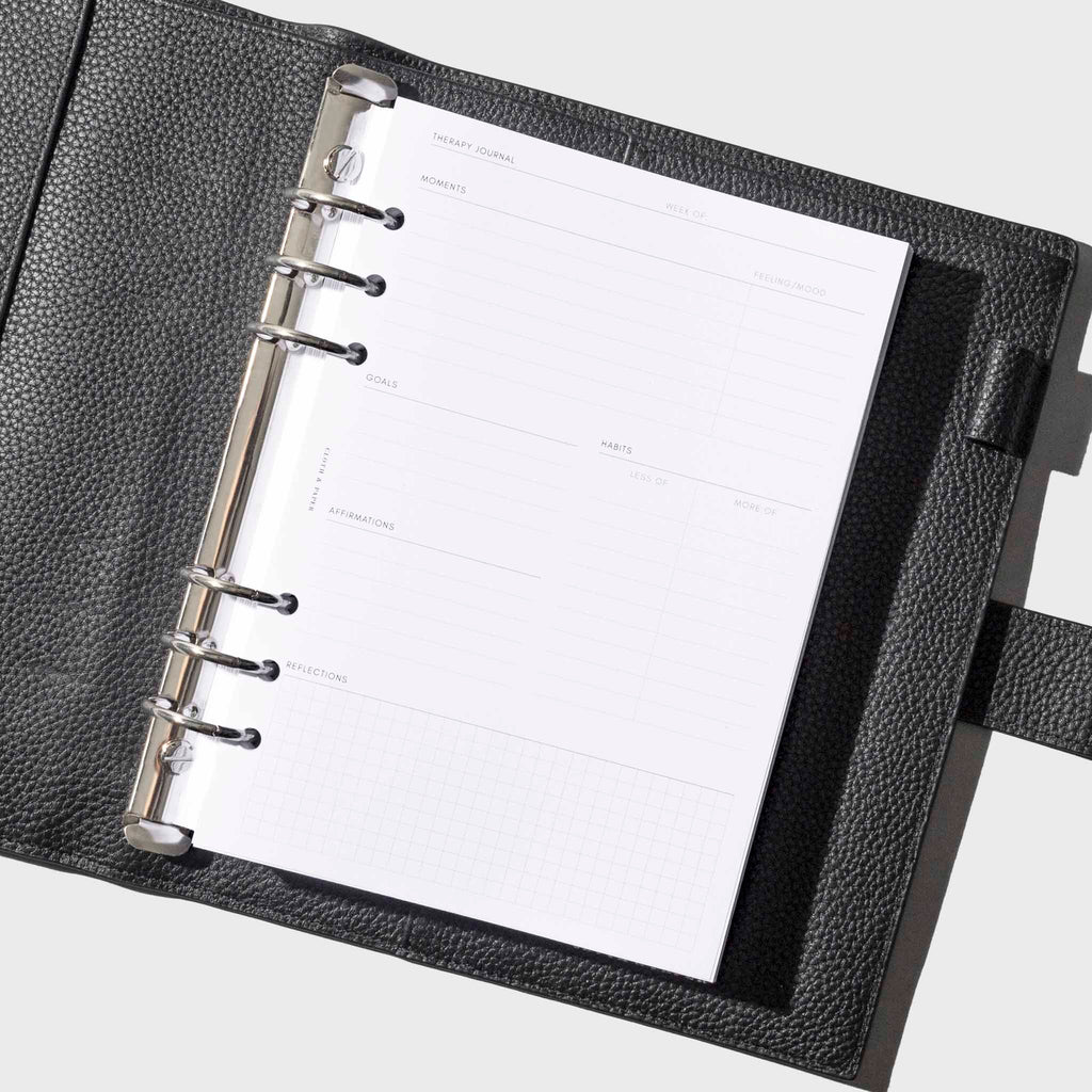 Insert shown in use inside a black leather agenda. Size shown is A5.