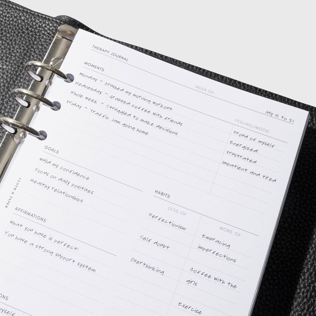 Insert shown in use inside a black leather agenda. Size shown is A5.