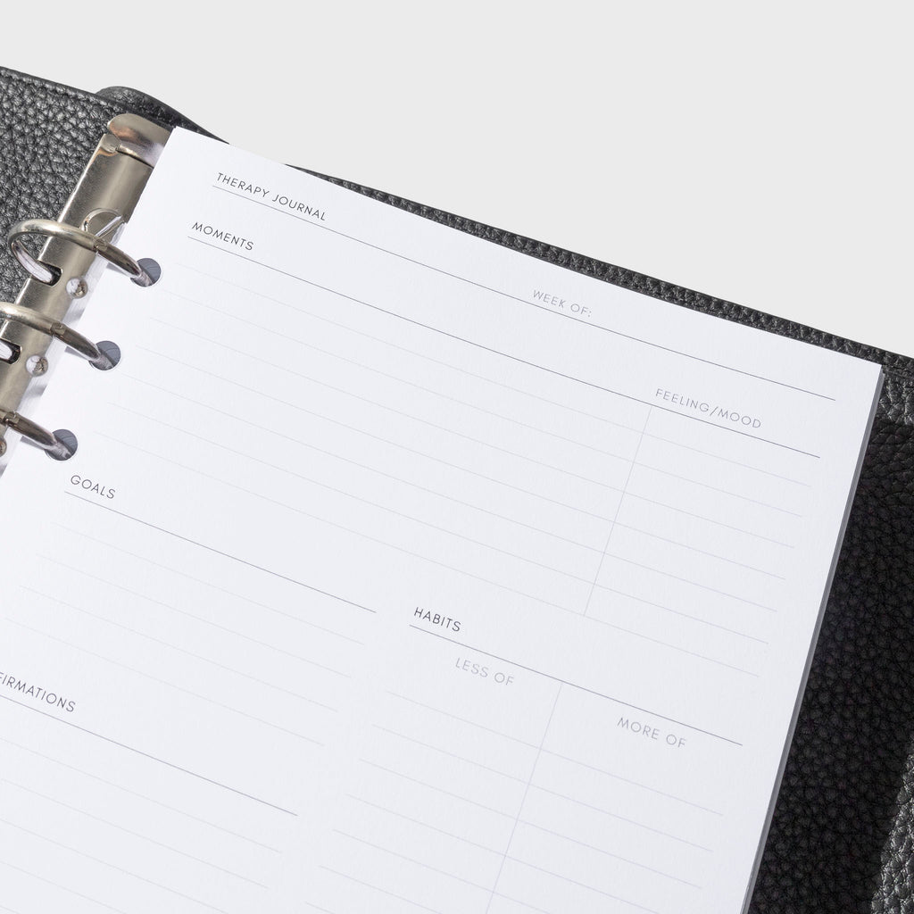 Insert shown in use inside a black leather agenda. Size shown is A5.