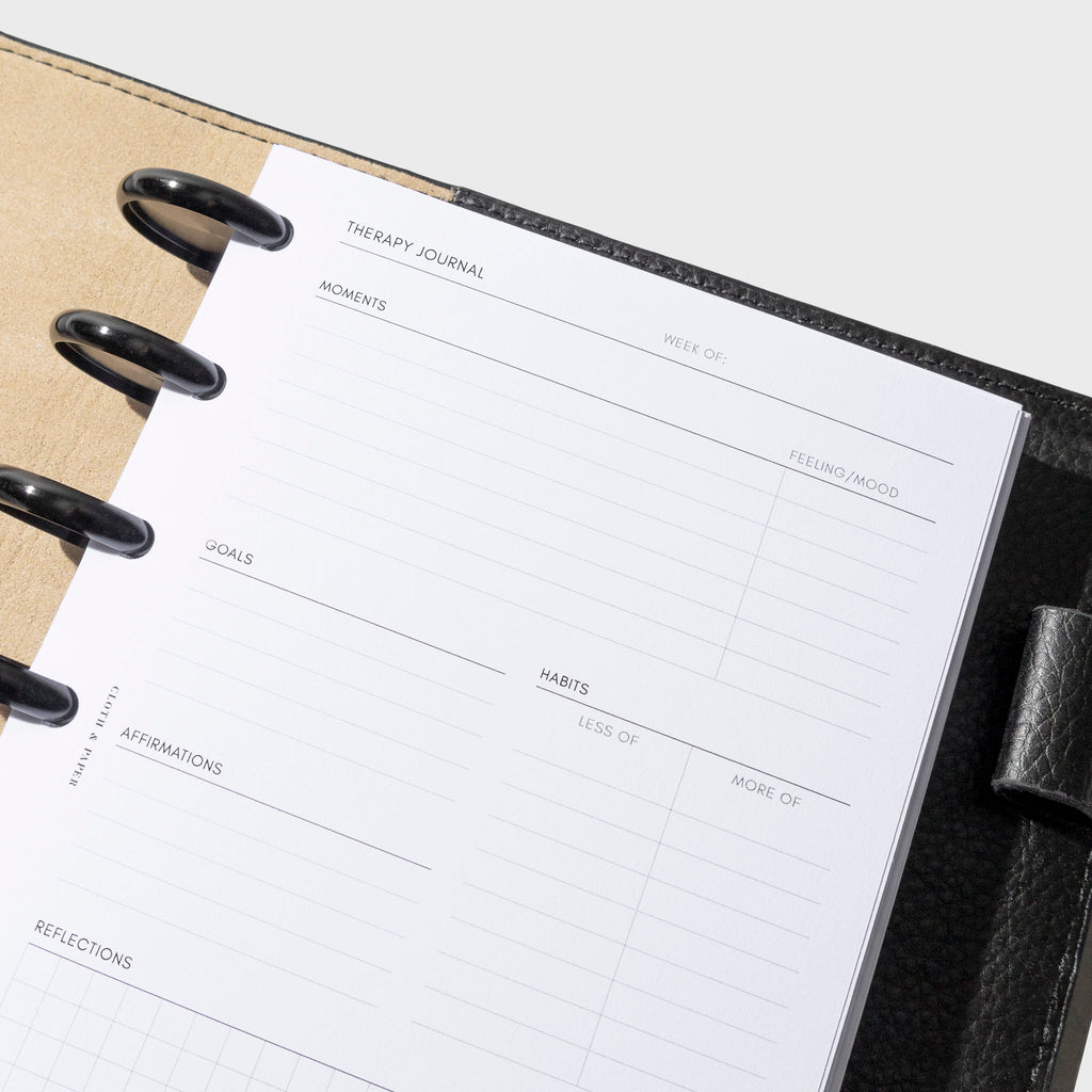 Insert shown in use inside a black leather agenda. Size shown is HP Mini.