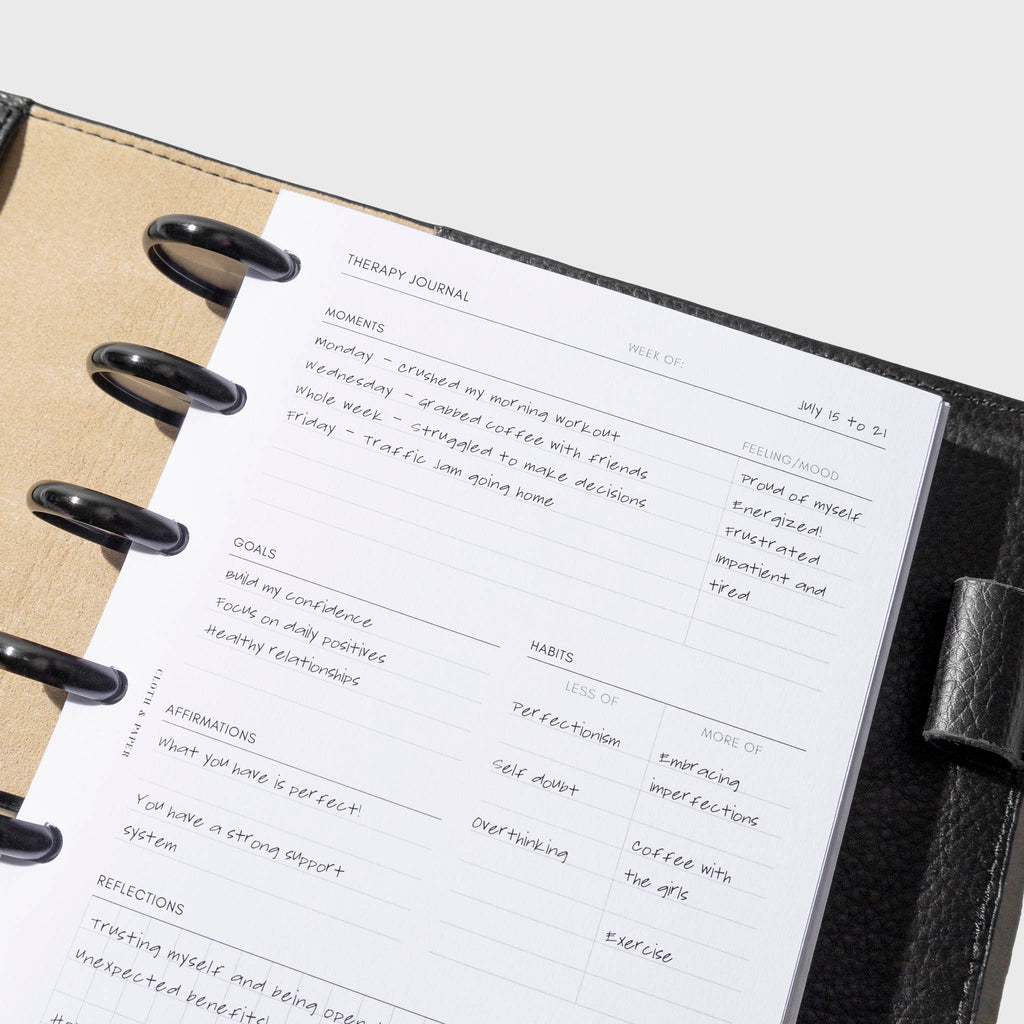 Insert shown in use inside a black leather agenda. Size shown is HP Mini.