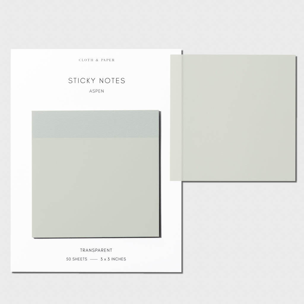 Sticky notes on their backing displayed on a white background. One sticky note is displayed on the corner of the backing to show its transparency. Color pictured is Aspen.