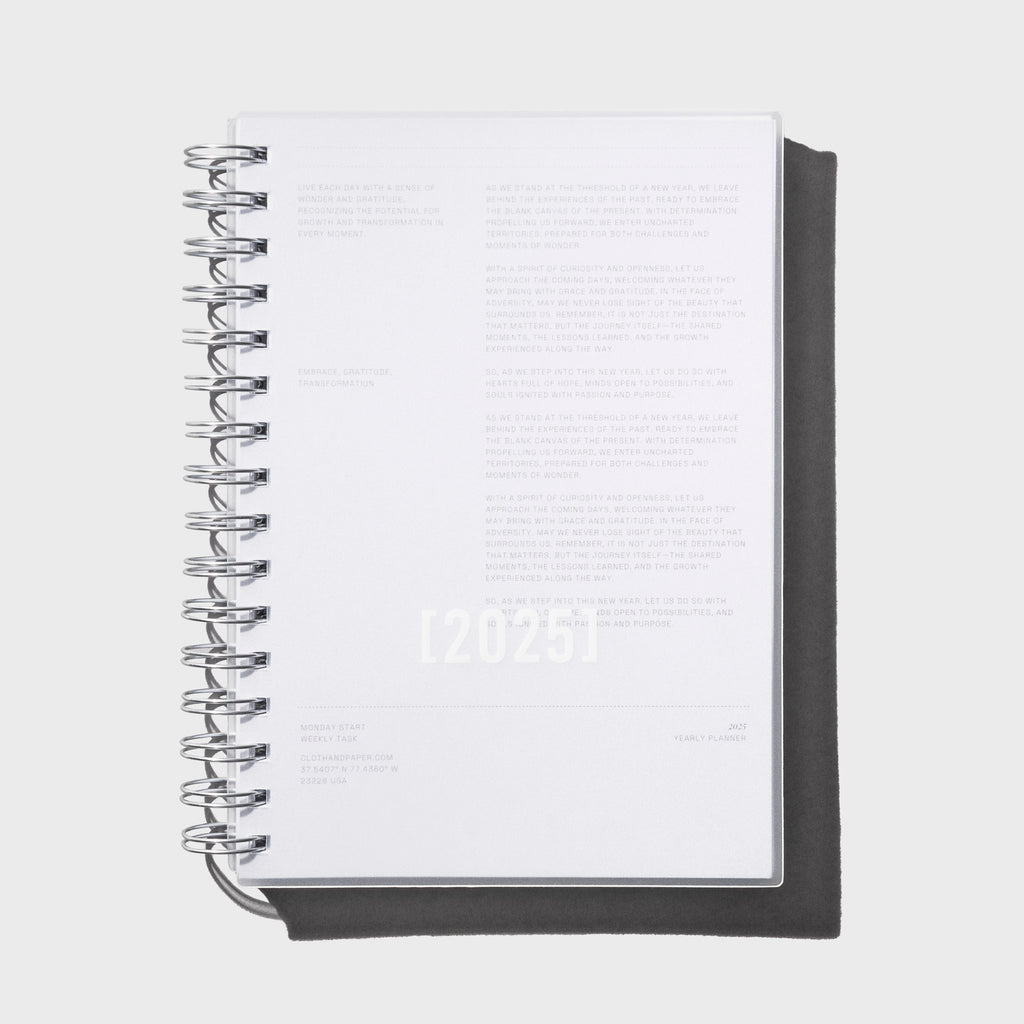 Notebook displayed on a neutral background.