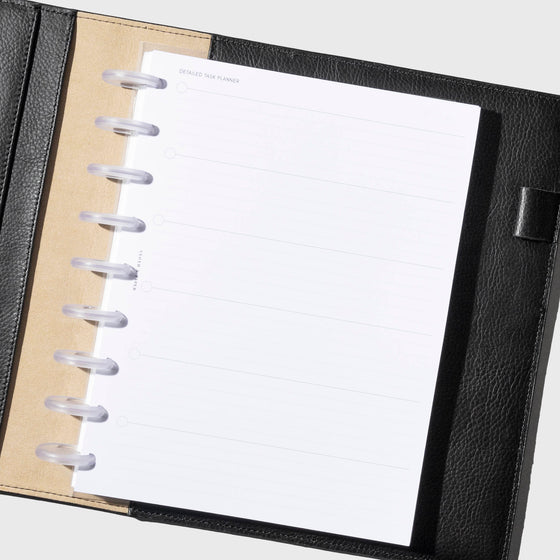 Insert in use inside a black leather folio. Size shown is HP Classic.