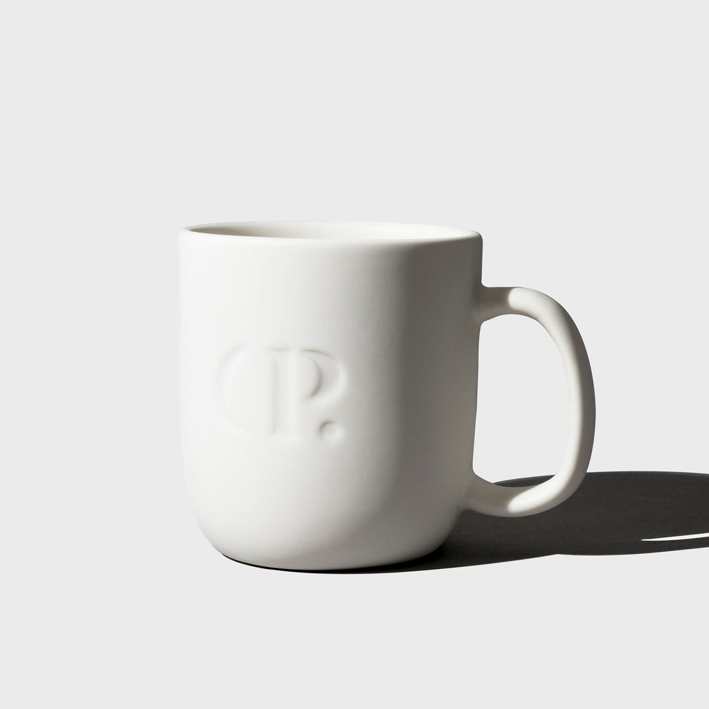 Cloth and Paper Mug, Cloth and Paper. Mug shown on a neutral background.