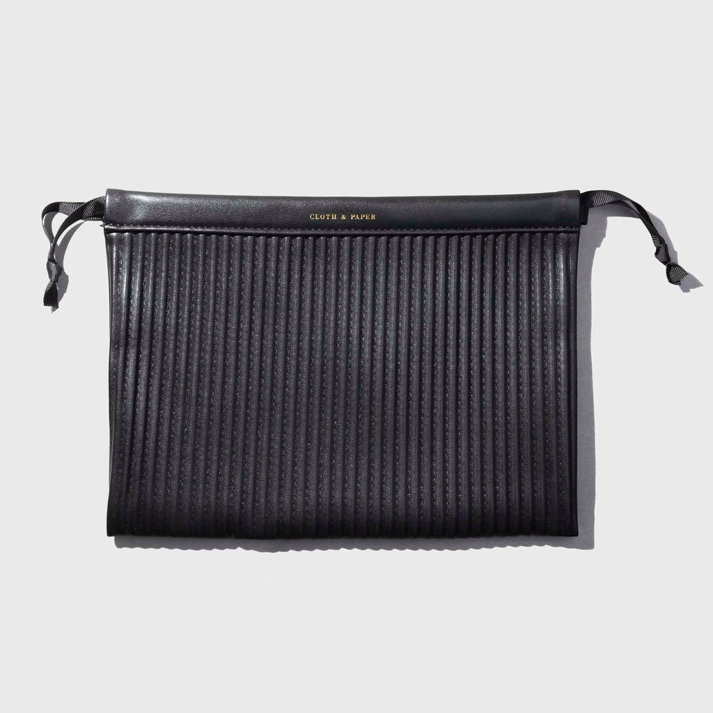 Pleated Dust Bag, Avant Garde, Cloth and Paper. Bag displayed on a neutral background.