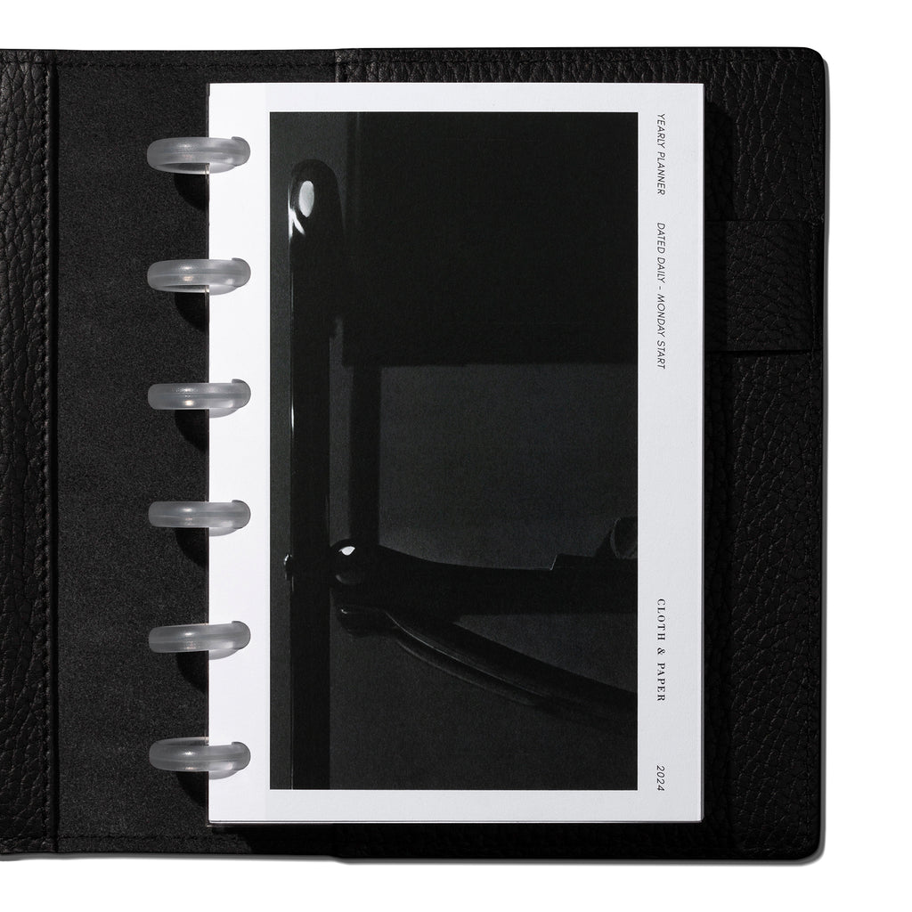 CP Petite inserts in use inside a black leather agenda.