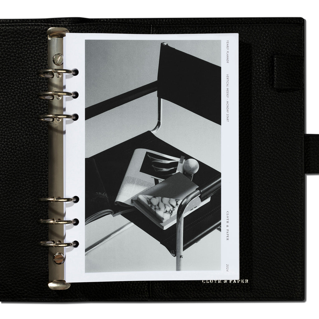 A5 inserts in use inside a black leather agenda.