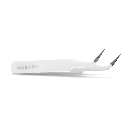 White tweezers displayed on a white background.