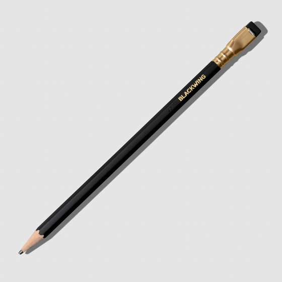 The image shows the blackwing matte pencil. It features a black pencil with a matching tapered eraser set in gold.