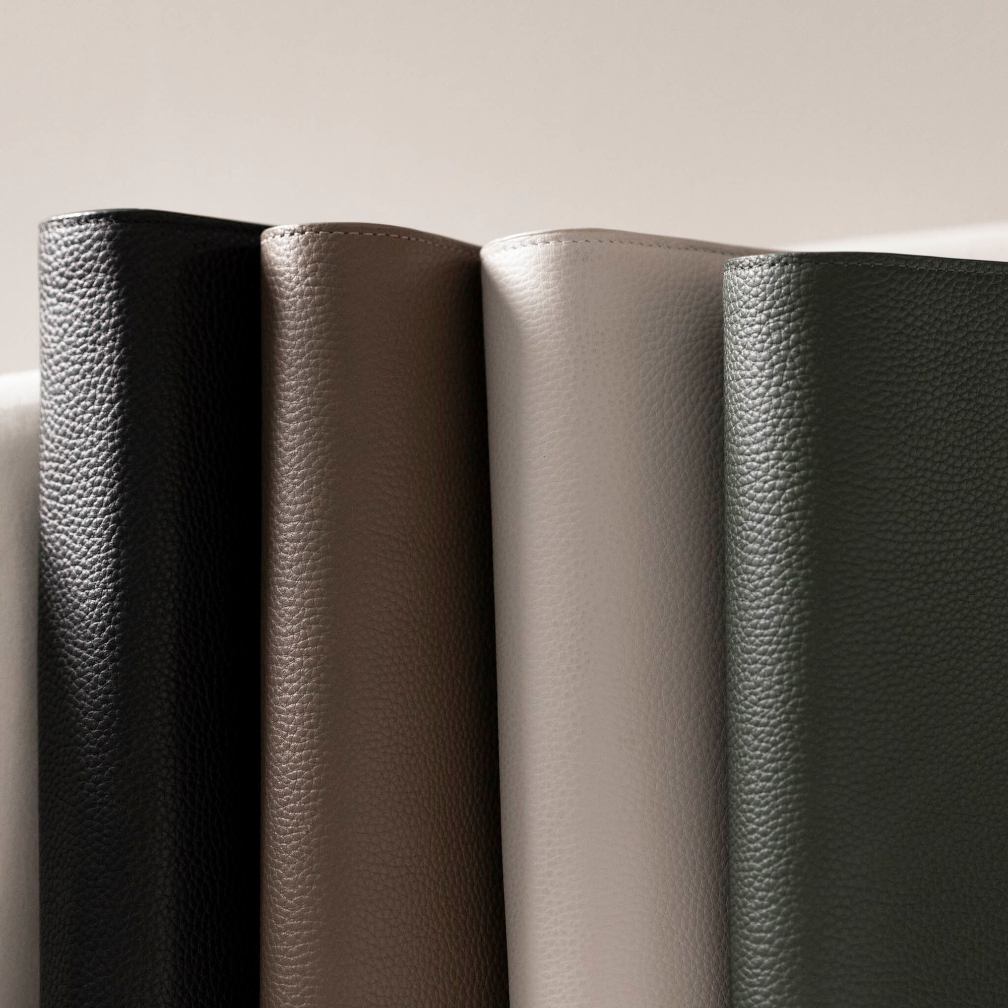 Horizontal display of the 4 color variants of the Foundations leather planners