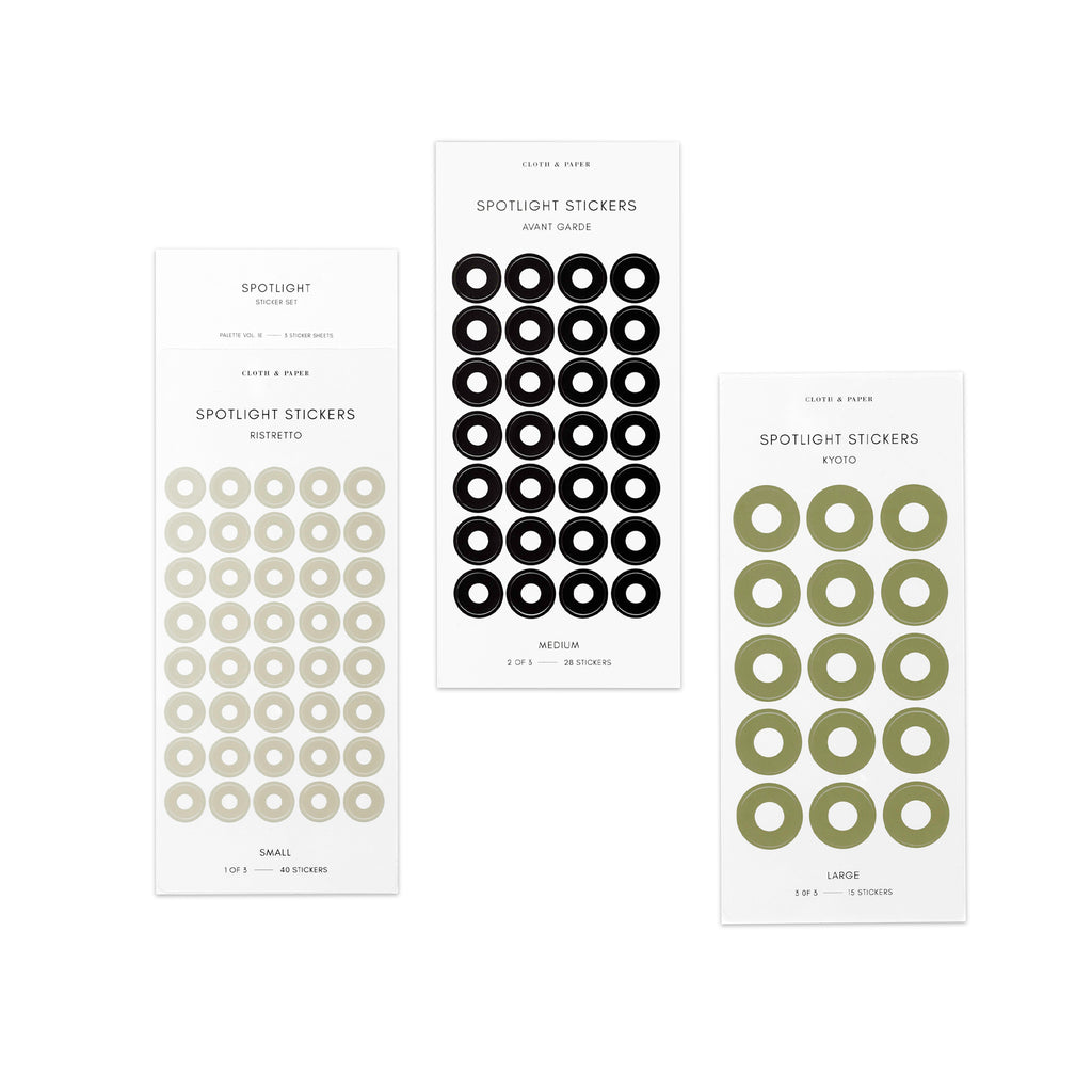 Three sheets of spotlight stickers in small, medium, and large sizing arranged together on a white background. Colors are ristretto, avant garde, and kyoto.