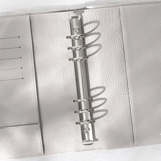 Closeup of silver hardware in an Ash leather agenda.