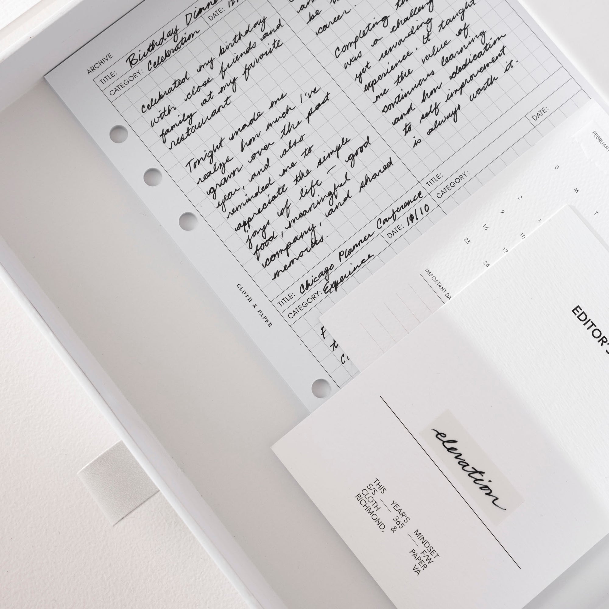 A sheet from the Archive Planner Inserts is filled out.  The sheet and other stationery items are inside the Storage Box 3.0.