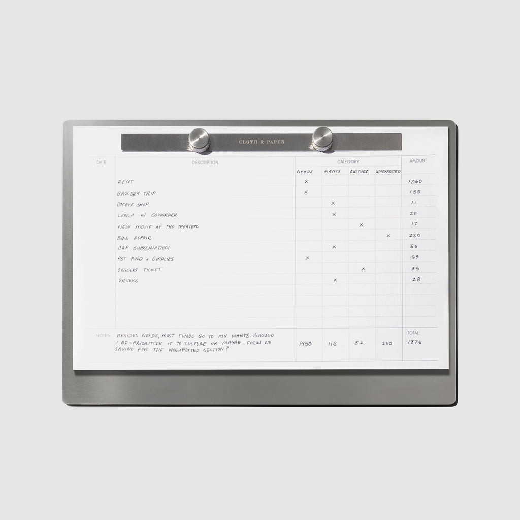 Modern Bound Notepad with Financial inserts shown on a neutral background.