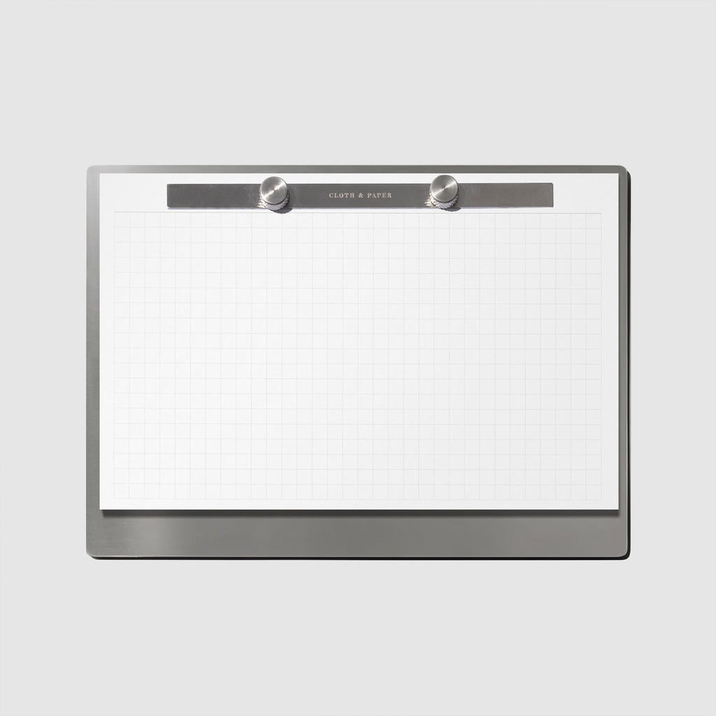 Modern Bound Notepad Insert Refills, graph, filled on the Modern Bound Notepad board, resting on a light gray background