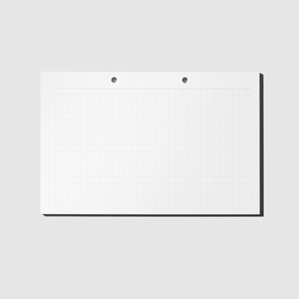 Modern Bound Notepad Insert Refills, graph, resting on a light gray background