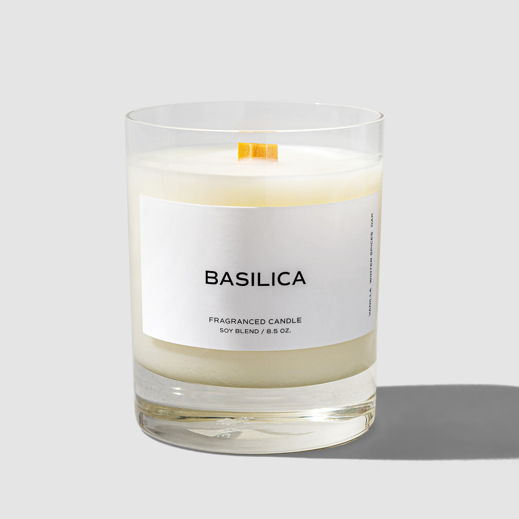 Basilica Candle, Cloth and Paper. Candle displayed with its label facing the camera on a neutral background. Label reads "Basilica" and the line below reads "Fragranced candle / Soy Blend / 8.5 oz"