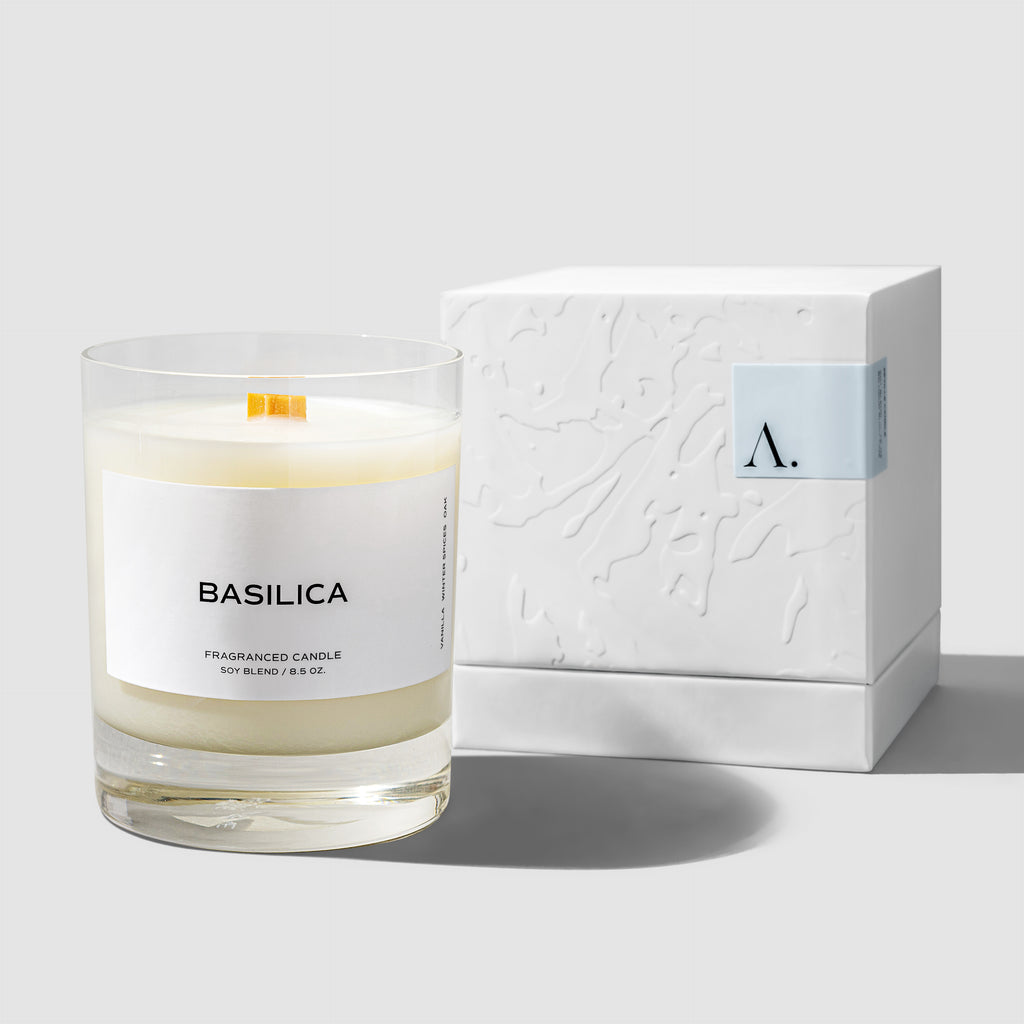 Basilica candle displayed next to its box on a neutral background.