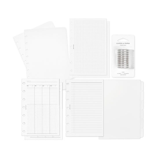 Cloth and Paper's HP MINI-sized Beginner Planner Bundle components elegantly presented on a white background, featuring a clear vinyl planner, blank side tab planner dividers, weekly schedule inserts, task planner inserts, and graph planner inserts.