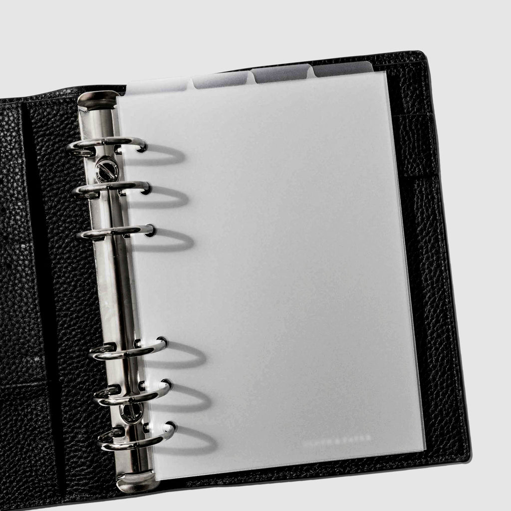 Personal Wide Dividers in use inside a black leather planner.