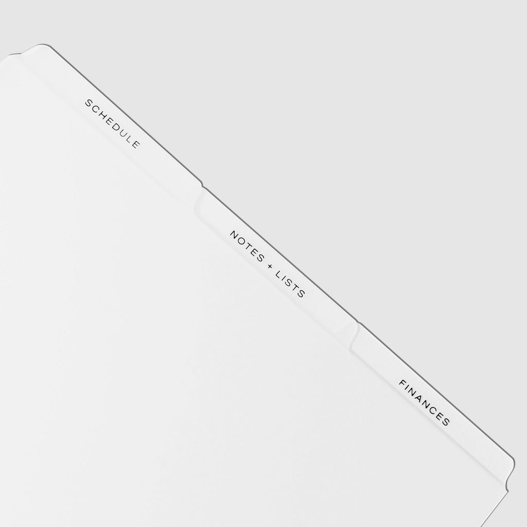 Closeup of black tab dividers displayed on a white background.