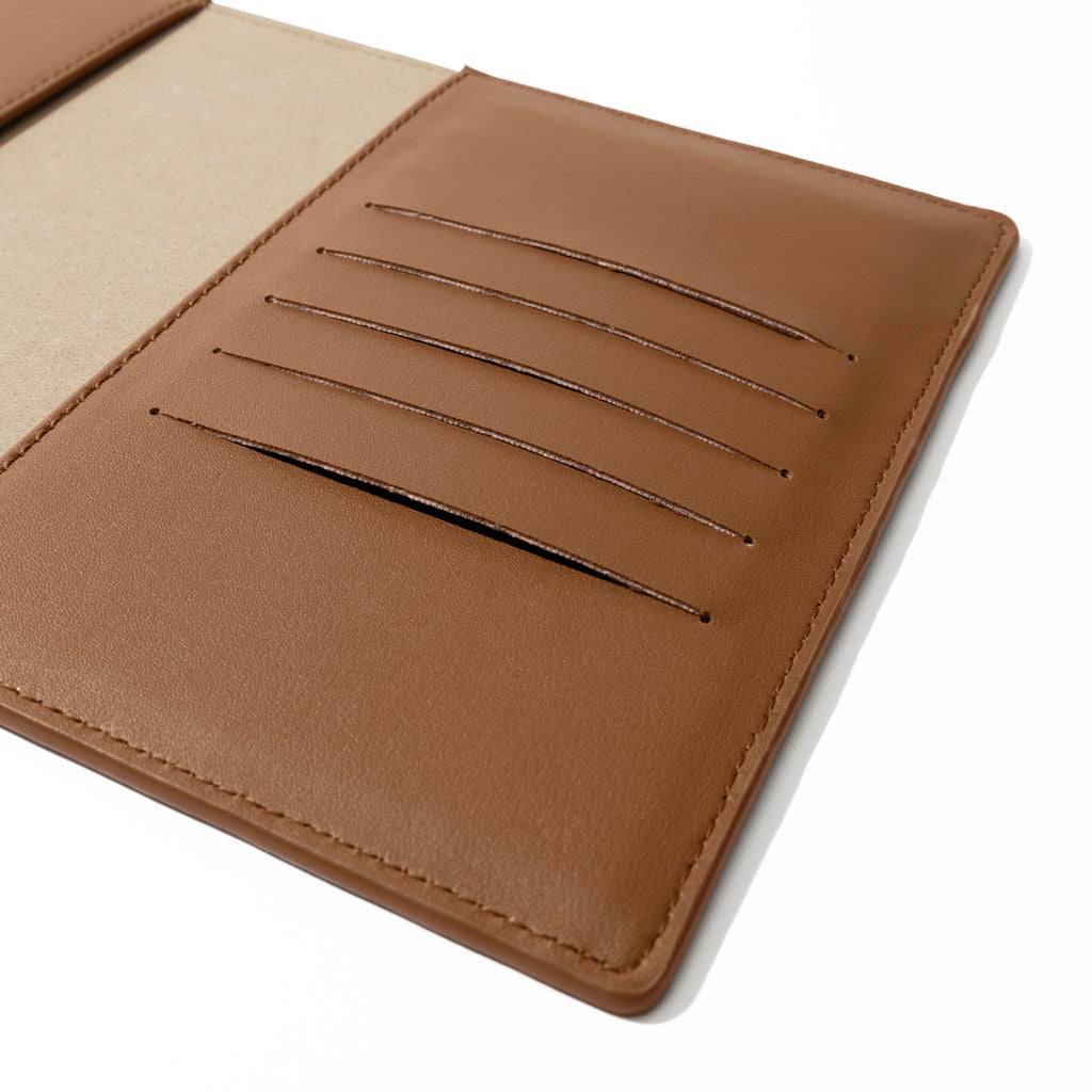 Closeup of folio's credit card slots. Color pictured is clay brown. 
