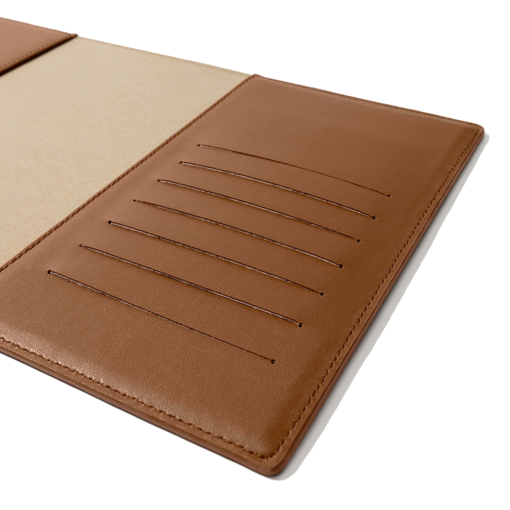 Closeup of folio's credit card slots. Color pictured is clay brown. 