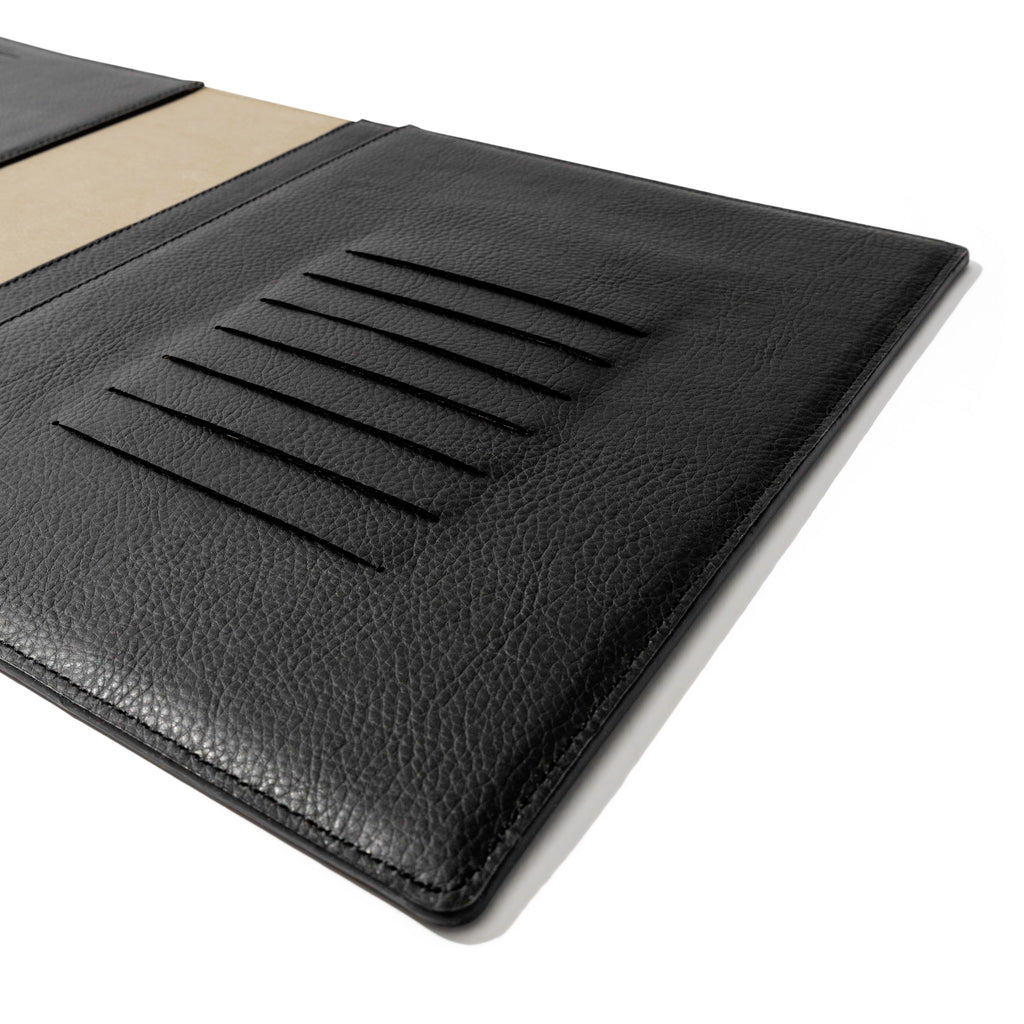 Closeup of folio's credit card slots. Color pictured is mesa black.