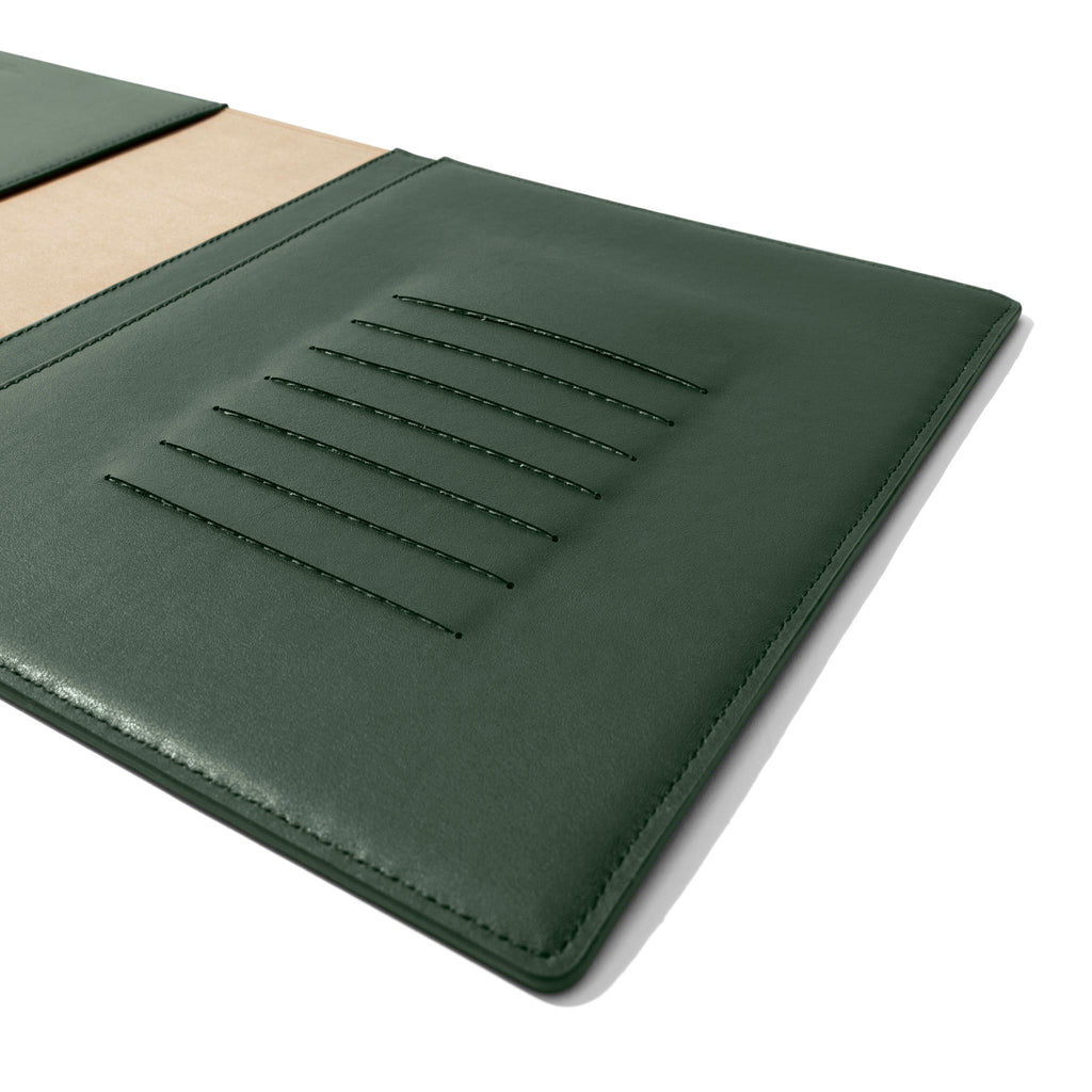 Closeup of folio's credit card slots. Color pictured is valley green.