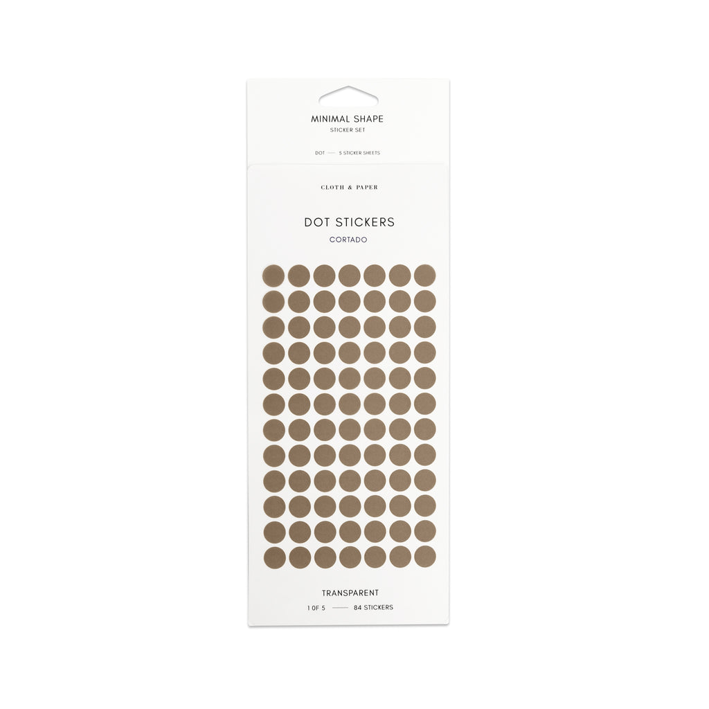 Cortado dot stickers in their packaging on a white background.
