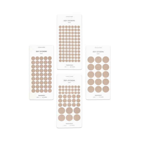 Four sheets of Nude dot stickers with varying sizes placed parallel to each other on a white background.