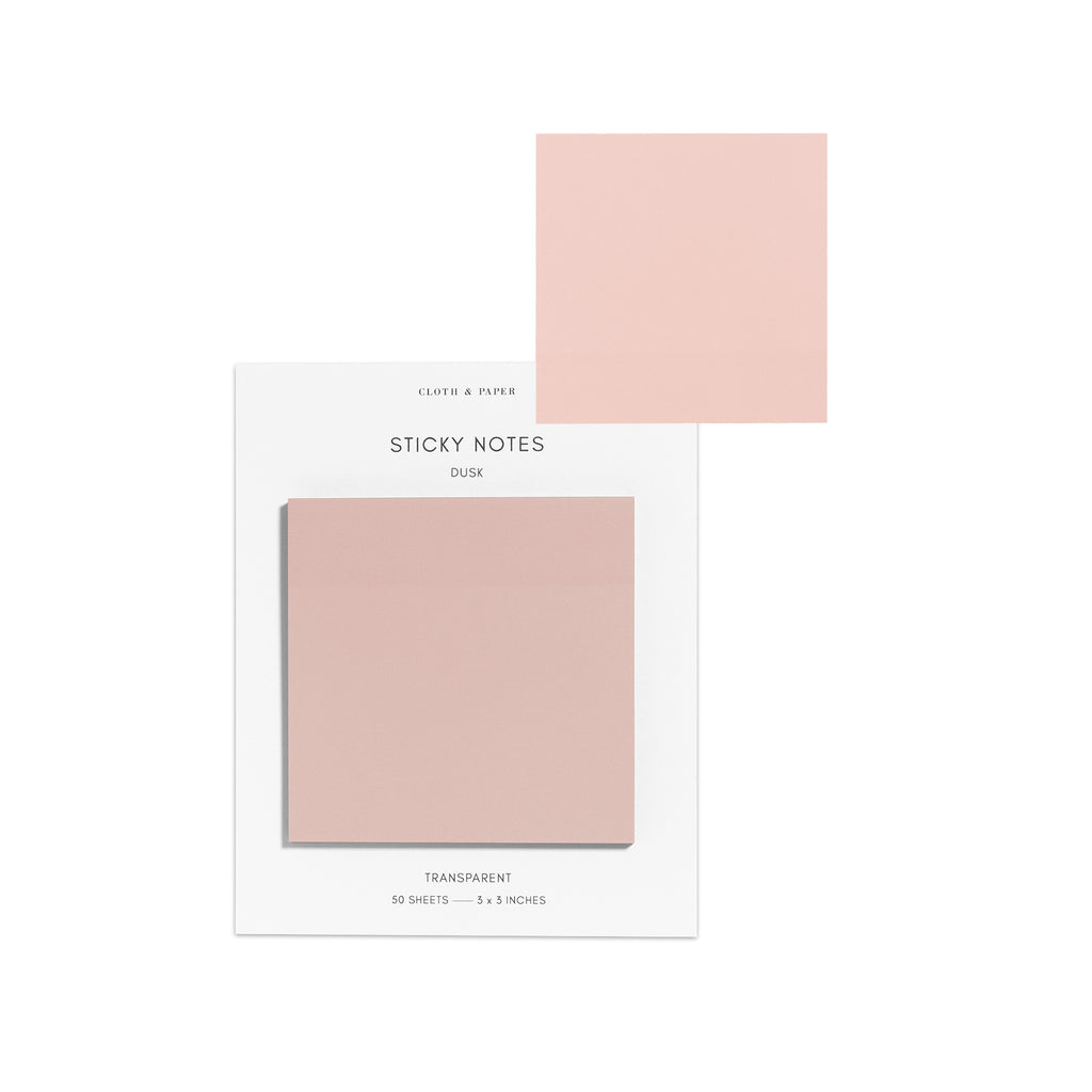 Sticky notes on their backing displayed on a white background. One sticky note is displayed on the corner of the backing to show its transparency. Color pictured is Dusk.
