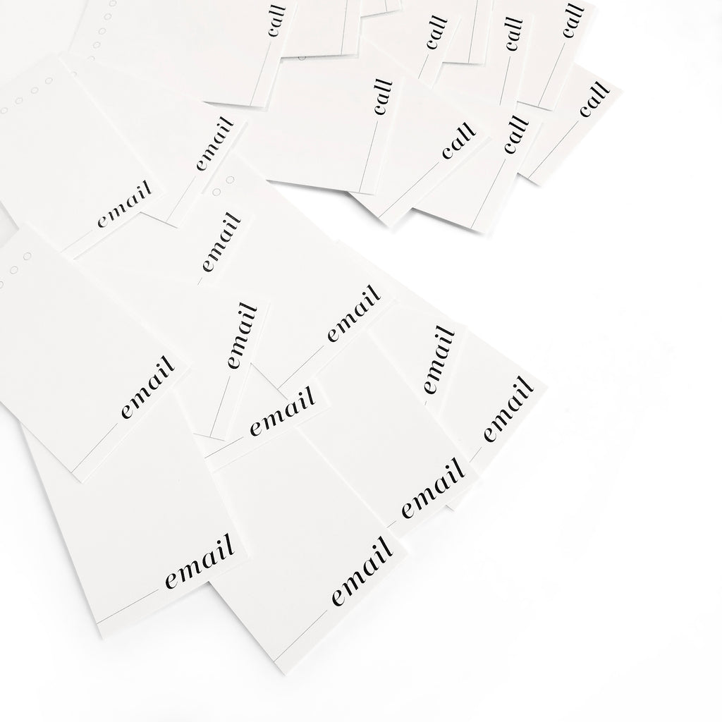 Cards arranged on top of each other on a white background.