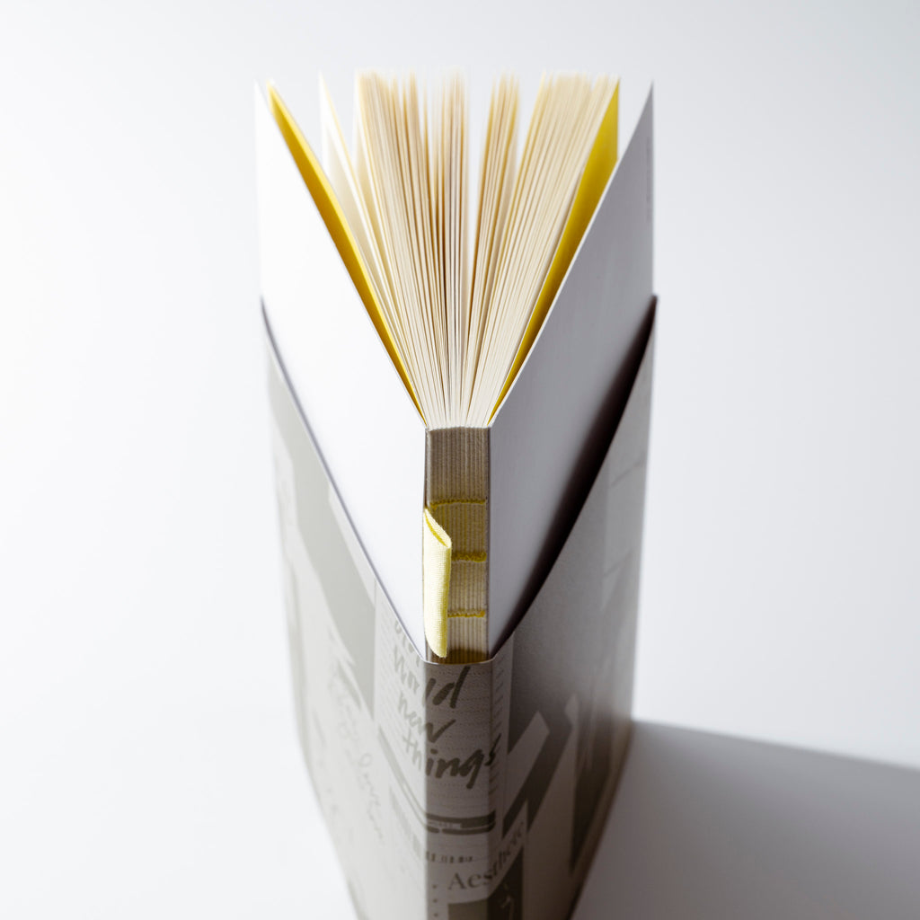 The spine and top view of the new Ensemble Notebook | A5 against a white background.