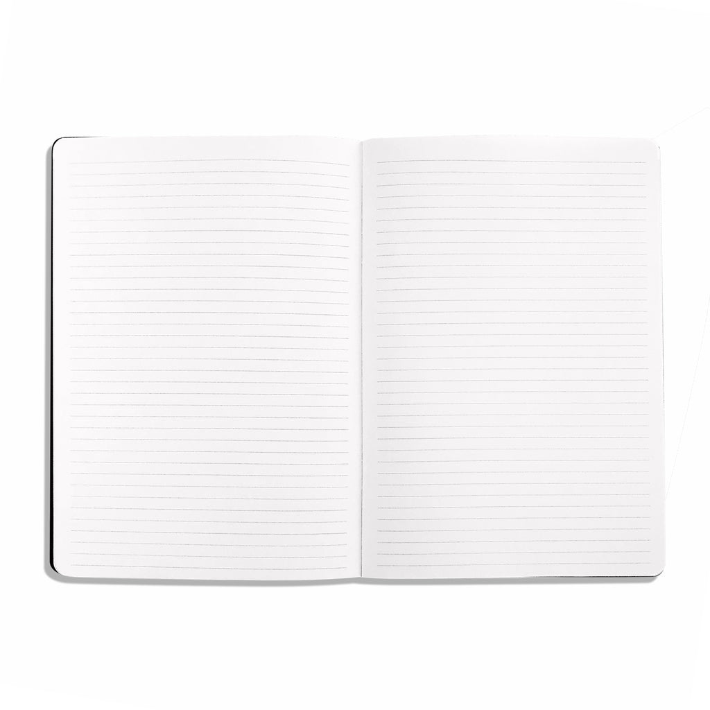 Grit and Grind Notebook, Lined, A5, Cloth & Paper. Notebook opened and displaying its interior lined pages on a white background.