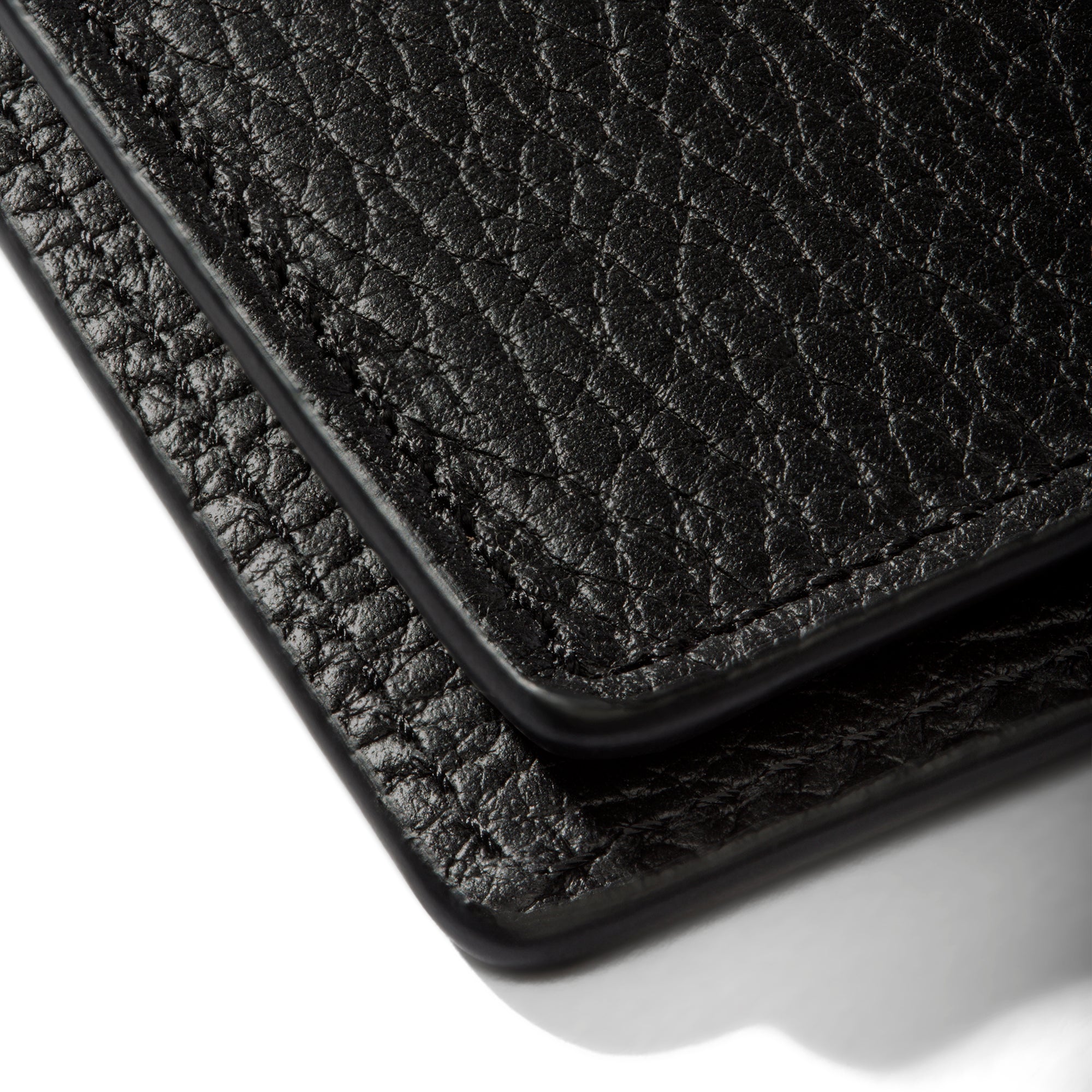 Closeup of Padrillo folio showing the stitching and glazing.