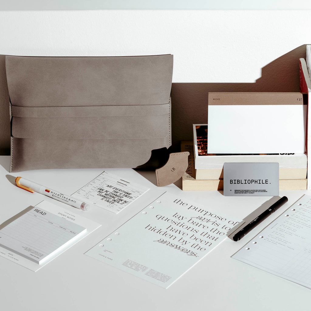 An image representing some spoilers from our July 2024 Intention Box.  The items are staged on a white desk.