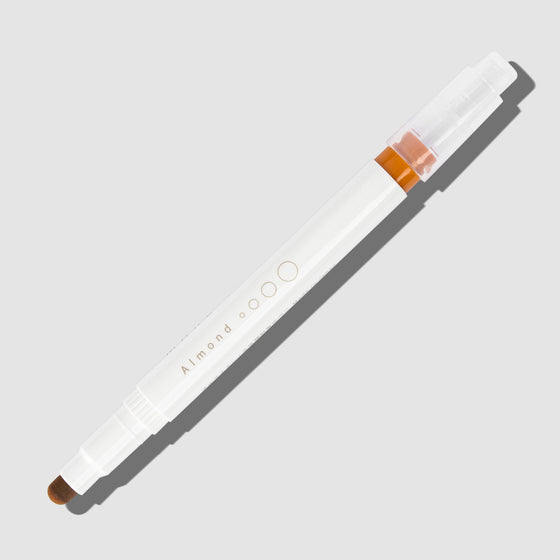 Kobaru Maru Liner, Almond, Cloth and Paper. Almond highlighter with tip exposed and cap posted to the end of its barrel on a white background.