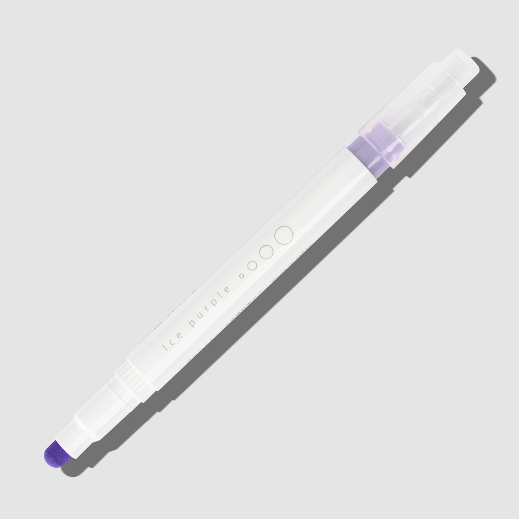 ce Purple highlighter with tip exposed and cap posted to the end of its barrel on a white background.