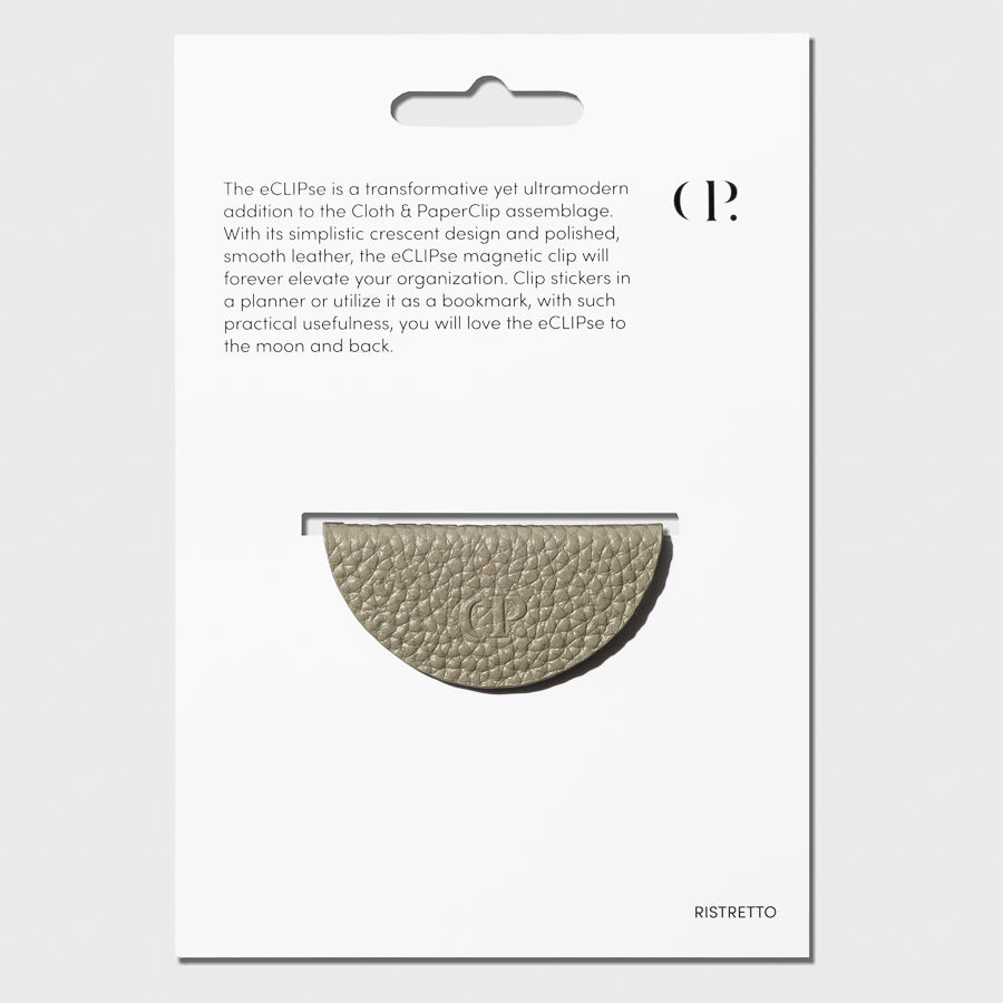 Beige bookmark shown in its packaging on a neutral background.