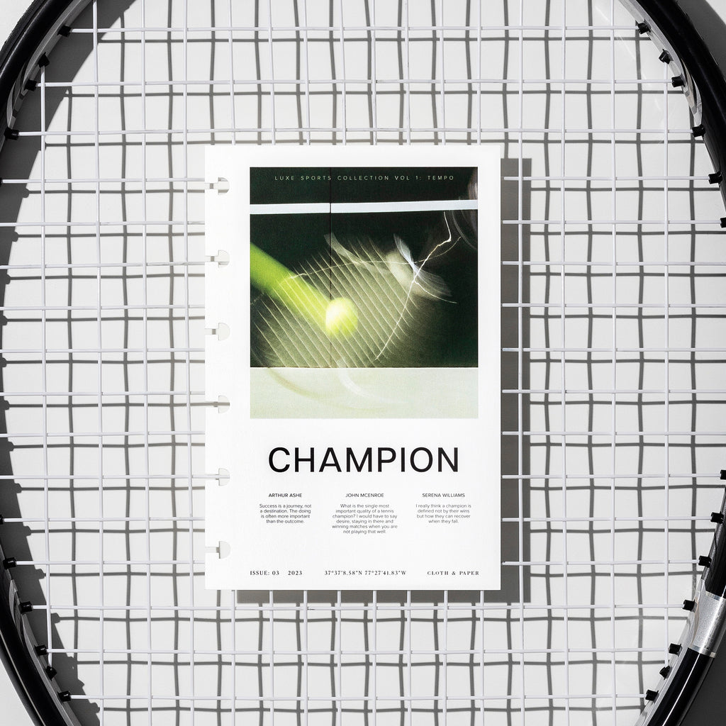 Champion  dashboard displayed on a tennis racket's netting. Size shown is CP Petite. 