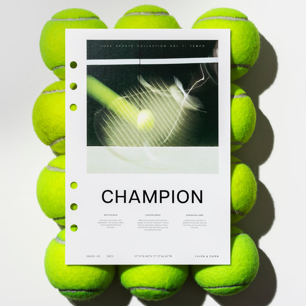 Champion dashboard displayed on top of 12 tennis balls. Size shown is A5. 