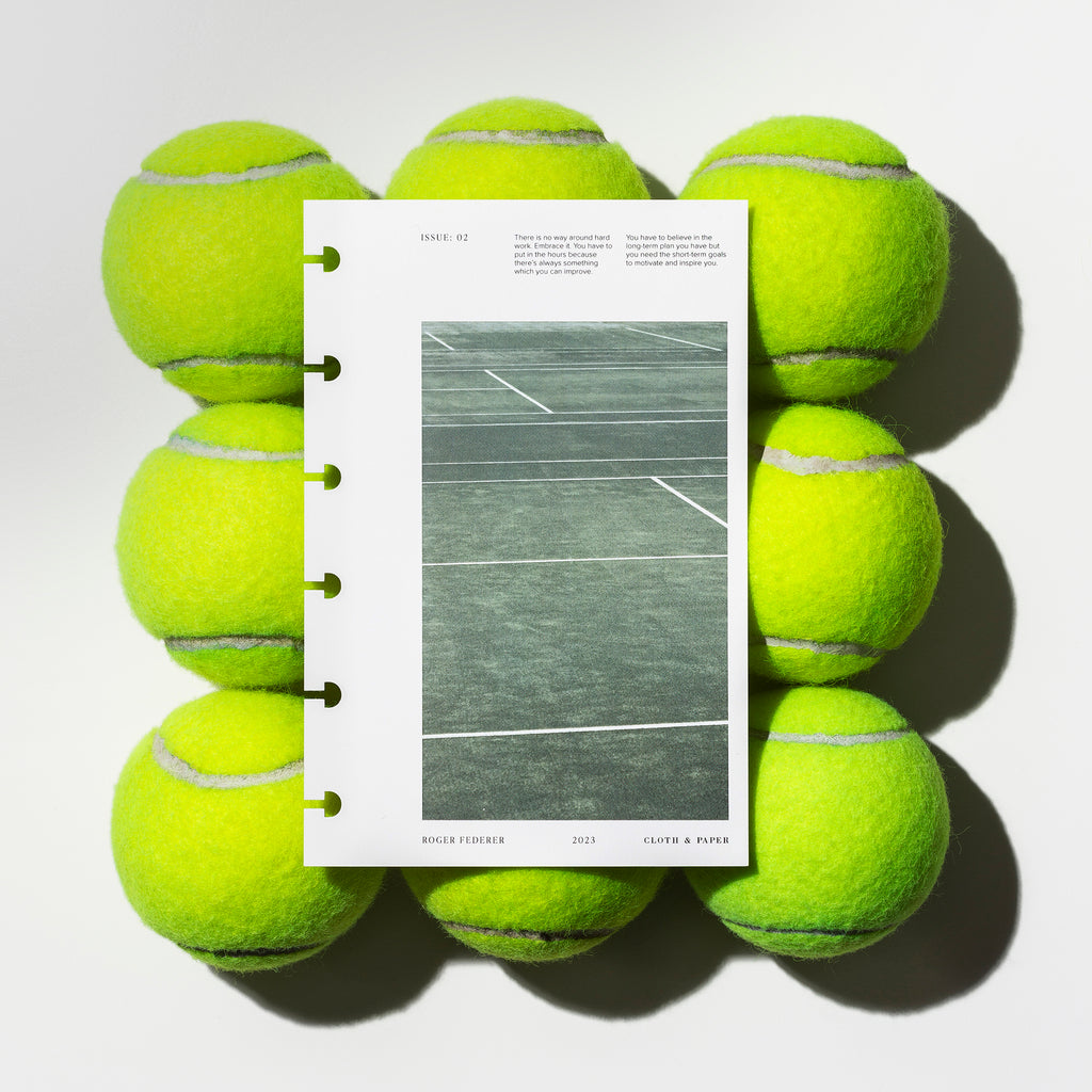 Full Court dashboard displayed on top of 12 tennis balls. Size shown is CP Petite. 