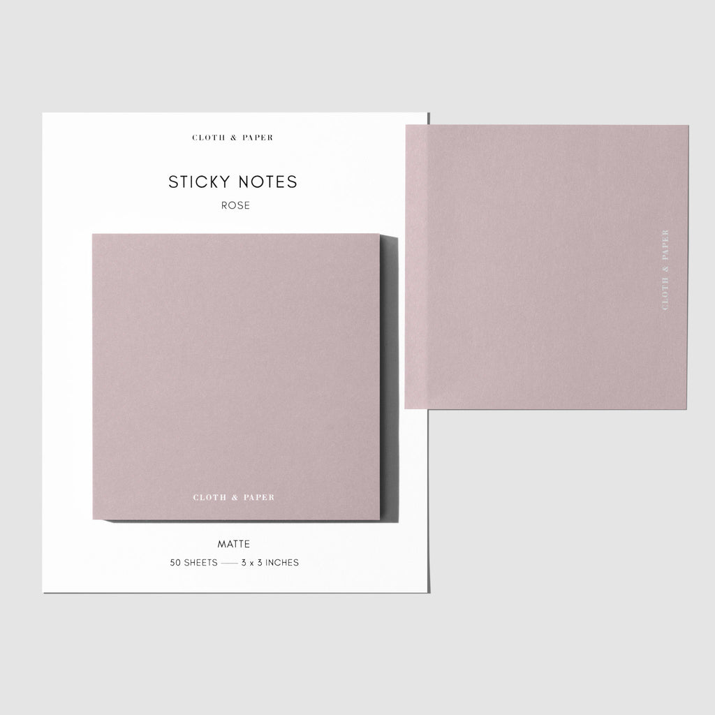 Sticky note set displayed against a white background. One note is placed on the packaging's edge. Color shown is Rose.