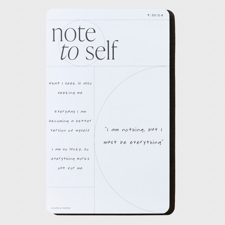 Notepad displayed on a neutral background, filled out with sample handwriting.