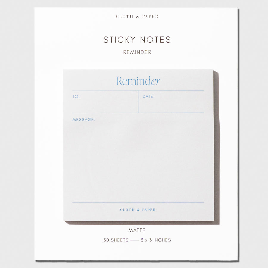 Reminder Sticky Note, Cloth and Paper. Sticky note on its backing on a neutral background.