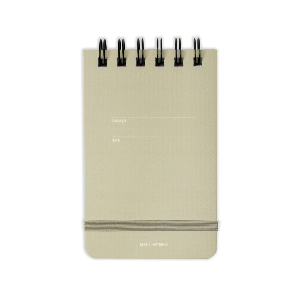 Blank notepad displayed on a white background.