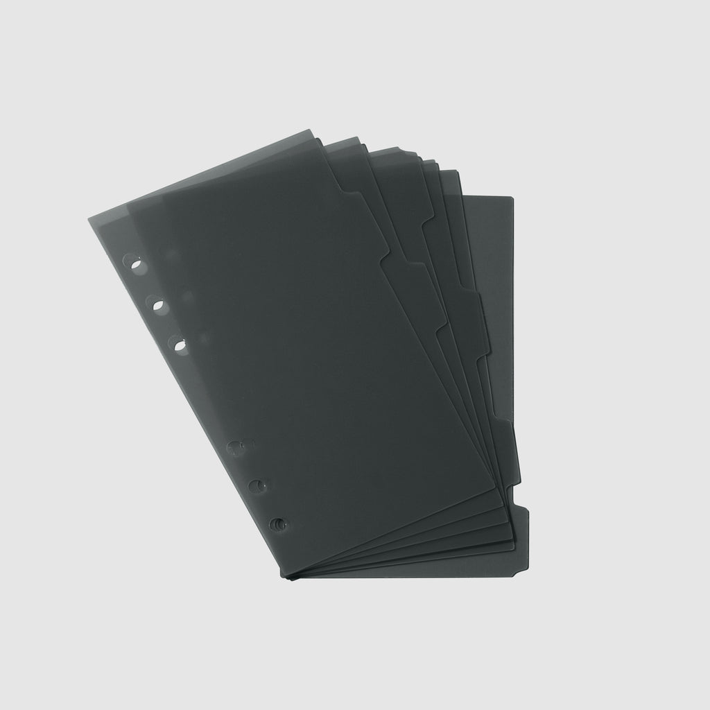 Six tinted gray dividers fanned out on top of one another displayed on a light gray background. Pictured size is Personal