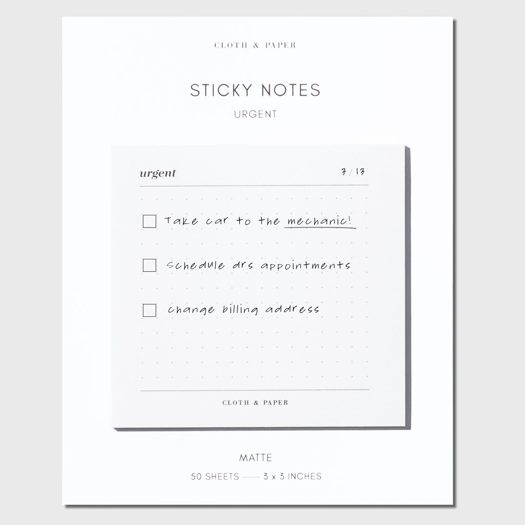 Sticky note in use. A checklist has been written on it, text as follows: "Take car to the mechanic!" / "Schedule doctor's appointment" / "Change billing address"